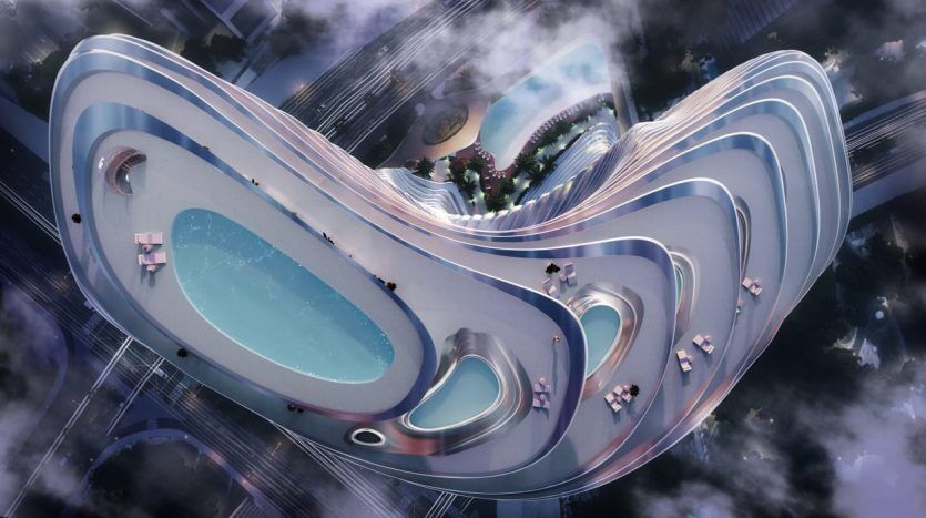 Vue aérienne d'une villa futuriste à Dubaï avec une conception architecturale ondulée et fluide qui comprend des terrasses de jardin à plusieurs niveaux et des piscines réfléchissantes, situées dans un paysage urbain au crépuscule.