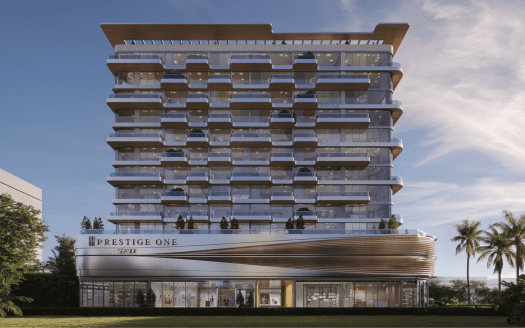 Bâtiment moderne de plusieurs étages à Dubaï avec un design ondulé unique aux étages inférieurs, de grandes fenêtres en verre et plusieurs balcons aux niveaux supérieurs, sous un ciel clair entouré d'une verdure luxuriante.