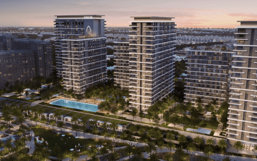 Une vue aérienne de luxueux immeubles résidentiels de grande hauteur au crépuscule à Dubaï, avec une verdure luxuriante, une piscine et des intérieurs illuminés, sur fond de toits de la ville.