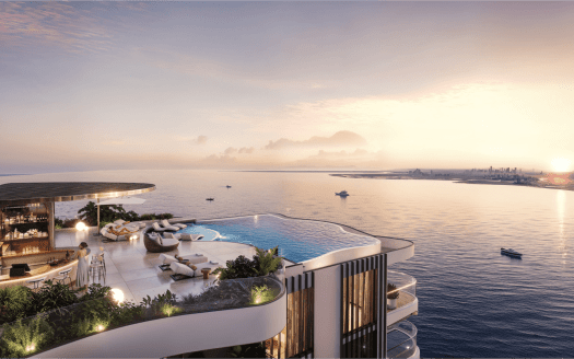 Un toit-terrasse luxueux surplombant un vaste océan, doté d'une piscine à débordement, d'un coin salon avec canapés et tables et d'une verdure luxuriante. Le soleil se couche, projetant une chaude lueur dorée sur l’eau. Les bateaux sont visibles au loin, ajoutant une touche de charme qui rappelle The Pier.