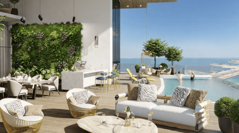 Luxurious rooftop terrace with elegant outdoor furniture, stylish kitchenette and infinity pool overlooking coastal views in a villa in Dubai, complemented by a bright green plant wall.