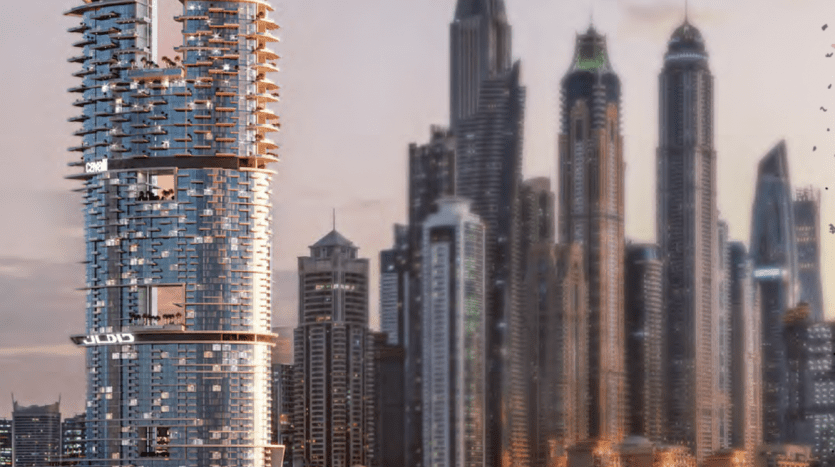 A modern cityscape at dusk, with the imposing Roberto Cavalli tower topped by "Damac", surrounded by several other high-rise buildings with twinkling lights.