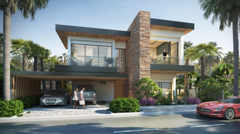 Maison moderne de deux étages avec briques et lambris en bois dans les lagons de Damac sur la Costa Brava, dotée de grandes fenêtres et d'un balcon. Une femme décharge des courses d'une voiture dans l'allée, avec