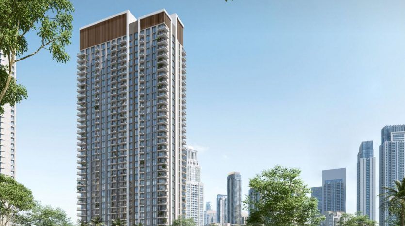 Rendering of the Creek Palace at Dubai Creek Harbour, featuring high-rise residential buildings amid lush greenery with people walking and children playing in a sunny urban park. This image captures the essence of the apartment beautifully.