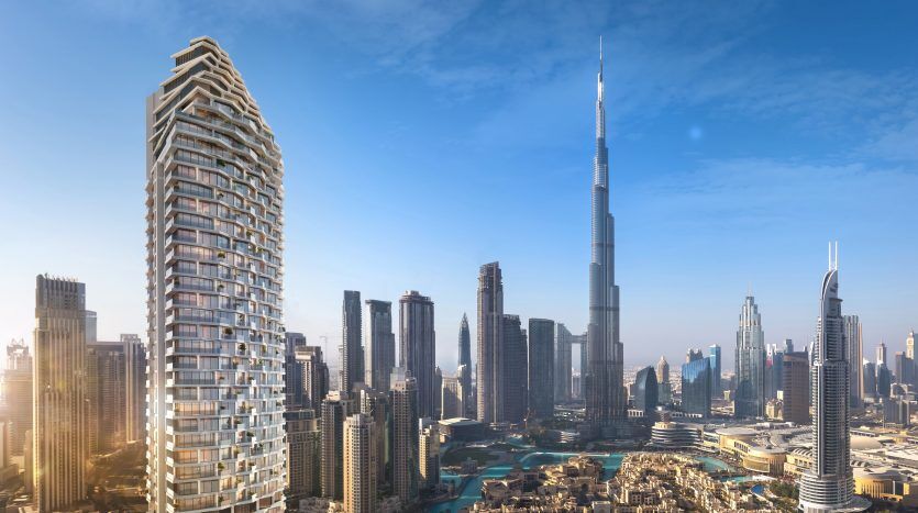 Une vue panoramique sur l'horizon de Dubaï mettant en valeur le Burj Khalifa parmi d'autres gratte-ciel sous un ciel bleu clair, offrant une excellente opportunité d'investir à Dubaï.