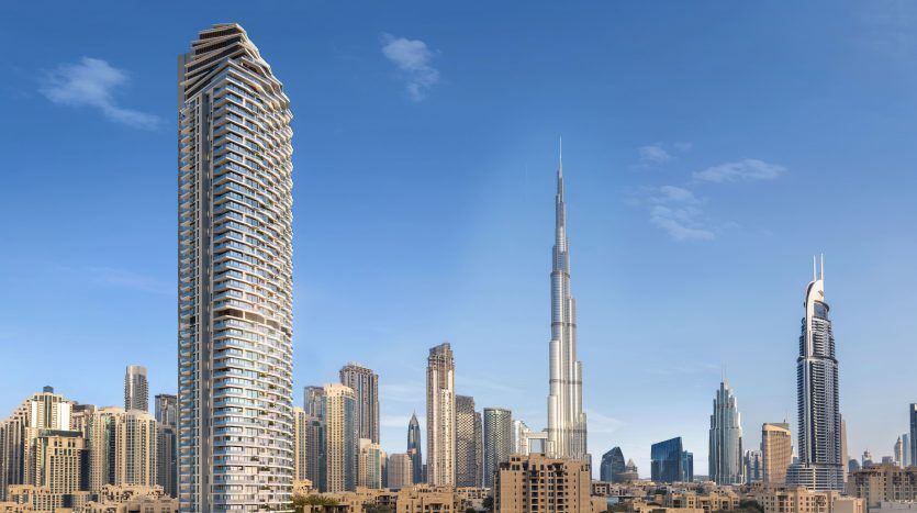 Skyline de Dubaï mettant en vedette le Burj Khalifa et d'autres gratte-ciel sous un ciel bleu clair, capturé par une agence immobilière réputée de Dubaï.