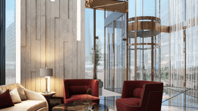 Modern living room with large windows, wooden walls, beige sofa, red armchairs and glass coffee table, under a unique chandelier. Bright natural light enhances the luxurious interior, making