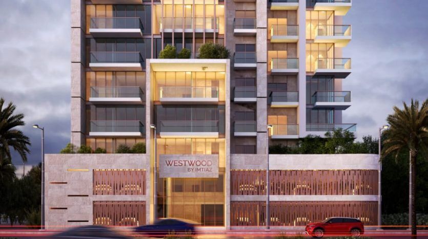 Un rendu numérique du Westwood d'Imtiaz, un immeuble moderne de grande hauteur avec une façade éclairée, un éclairage spectaculaire et une circulation floue au premier plan au crépuscule, mettant en valeur le principal investissement de Dubaï.