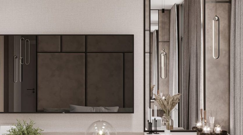 Intérieur de salle de bain moderne et élégant comprenant un grand miroir, une double vasque avec lavabos intégrés, des murs texturés et une décoration minimaliste. Des tons neutres avec des accents métalliques et en verre rehaussent le look sophistiqué de cette villa à Dubaï.
