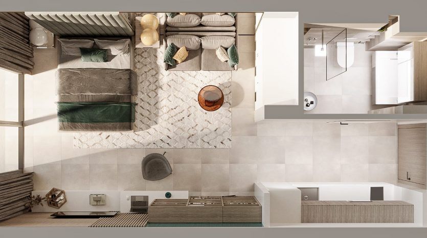 Vue de haut en bas d'un studio moderne à Dubaï comprenant un coin chambre avec un lit double, un coin salon avec un canapé et une section salle de bain avec douche et baignoire, le tout dans des tons neutres.