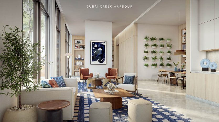 Vue intérieure d'un salon moderne dans un appartement de Dubaï, comprenant un canapé, des meubles en bois, des plantes d'intérieur et des œuvres d'art, étiqueté "The Cove Dubai Creek Harbour par Emaar.