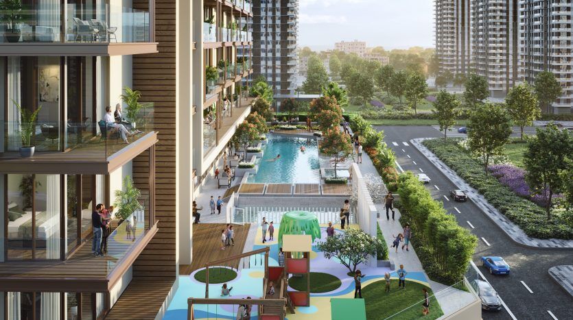 A vibrant community scene in Dubai with an outdoor pool, playground and lush gardens surrounded by high-rise buildings. People enjoy a variety of activities in a sunny urban setting.