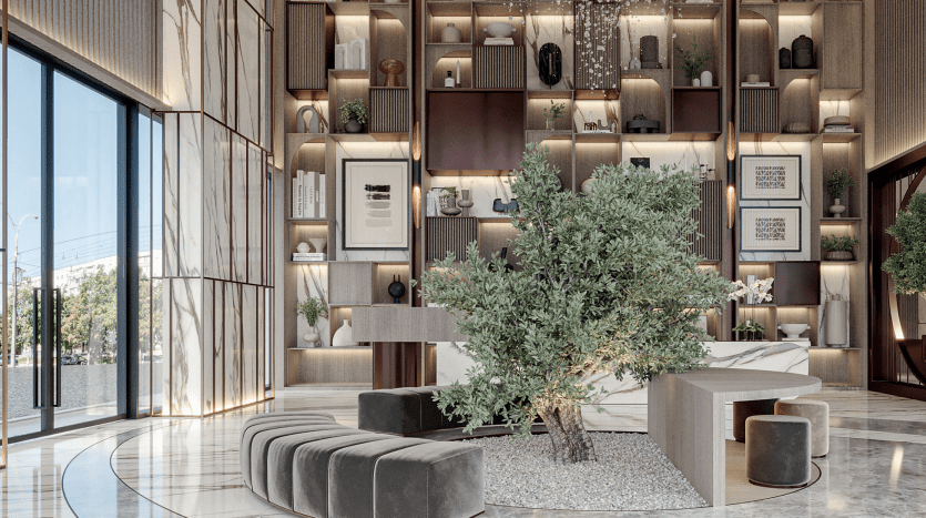 Modern office lobby with extensive shelving, elegant seating areas and a large indoor plant. Natural light streams in through the bay windows. The décor includes framed works of art and elegant lighting typical of a