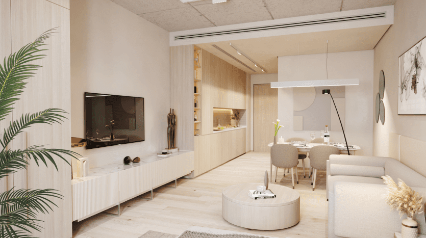Modern living room and open kitchen with neutral tones, contemporary furniture, TV, dining area and pendant lighting, with elegant decorative elements and wooden accents in a Dubai villa.