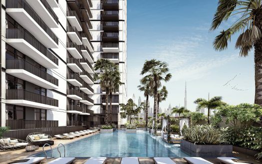 Un moderno appartamento di alto livello a Dubai con balconi che si affacciano su una lussuosa piscina all'aperto circondata da palme e lettini, con un cielo azzurro e limpido e uccelli che volano in formazione.
