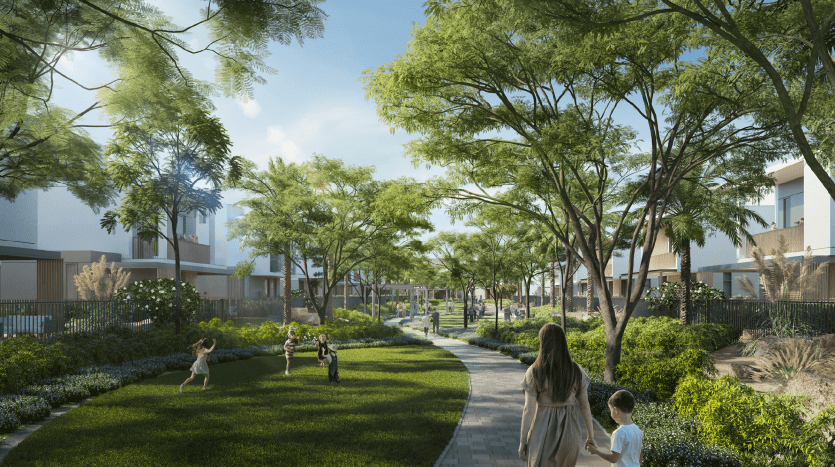 Un jardin communautaire animé avec une verdure luxuriante, des enfants qui jouent et une femme marchant le long d'un chemin courbe, avec la villa moderne de Dubaï flanquant les côtés sous un ciel bleu clair.