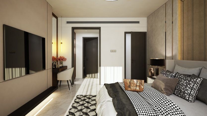 Intérieur de chambre moderne dans un appartement de Dubaï avec un grand lit doté d'une literie à motifs, d'une télévision murale, d'un plafonnier circulaire et d'un mélange de bois chaleureux et de tons beiges.