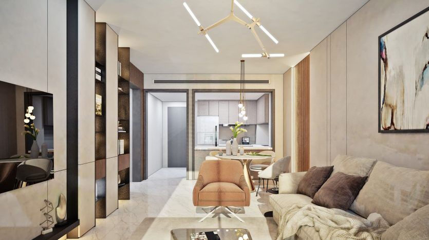 Salon moderne avec un canapé beige, un fauteuil, une table basse en verre, des œuvres d'art contemporaines au mur et un coin repas connecté avec un éclairage élégant au plafond dans une villa de Dubaï.