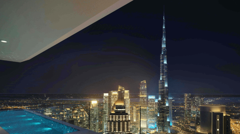 Una vista nocturna desde un piso elevado en Dubai con piscina en la azotea con vistas a un paisaje urbano, destacando el Burj Khalifa entre otros rascacielos iluminados bajo un cielo sin estrellas.
