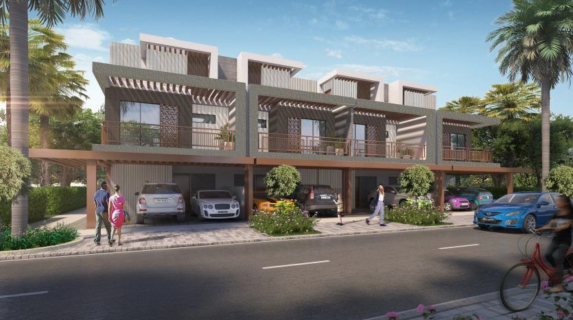 Ein zeitgenössisches Wohngebäude in Dubai mit mehreren Einheiten, die über schattige Balkone und Carports verfügen. Im Vordergrund sind Menschen und Autos entlang einer angelegten Straße zu sehen.