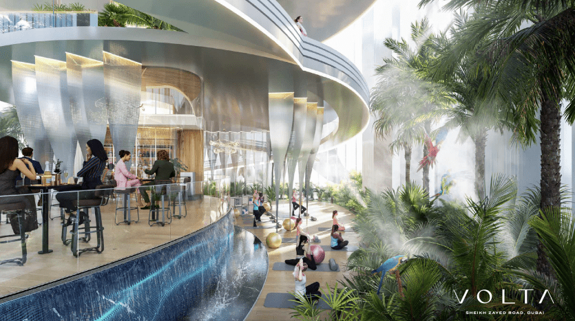 A modern, lush interior space in a Dubai villa with a bar area where people sit, an inviting water feature and greenery everywhere under a curved, lighted ceiling.