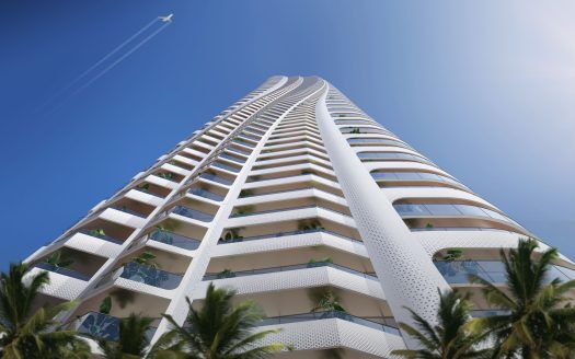 Un imponente e moderno grattacielo bianco con balconi curvilinei si protende verso un cielo azzurro e limpido, con palme in primo piano e una scia di jet al di sopra, incarnando l'immobile più importante di Dubai.