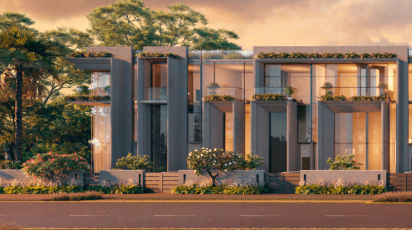 Modern townhouses with sleek design and large windows, each unit features a balcony with green plants, surrounded by palm trees under a gentle sunset, perfect for Dubai real estate.
