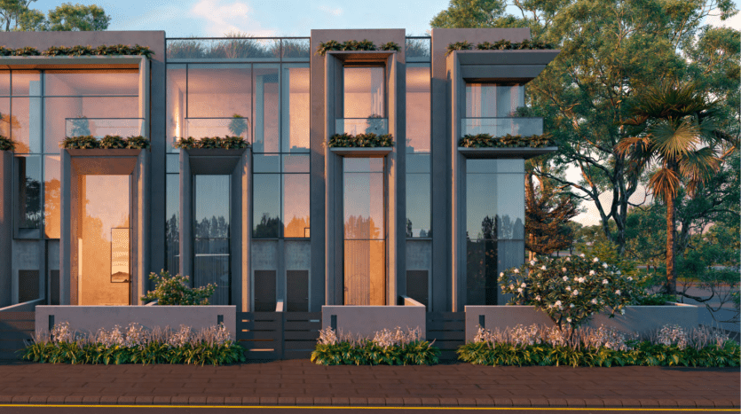 Modern townhouses with reflective glass windows and vertical gardens integrated into the facade. As the setting sun casts a warm glow, highlighting well-manicured landscaping dotted with various trees and bushes, this illustrates