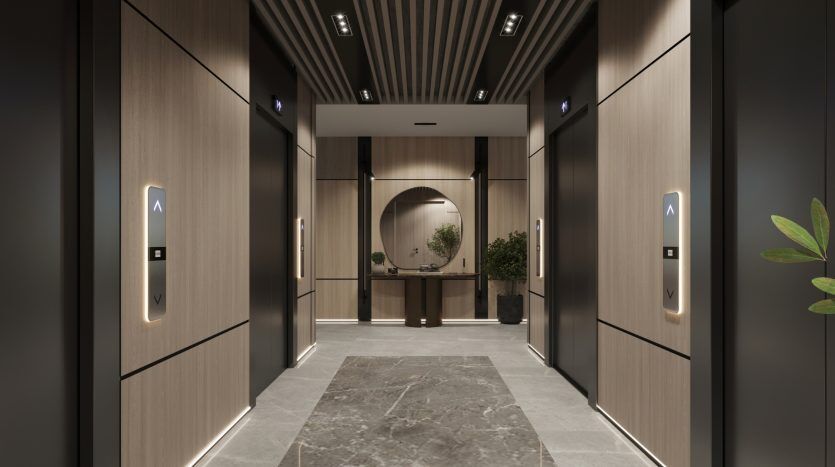 Hall d'ascenseur moderne dans un prestigieux appartement de Dubaï, avec des murs en bois élégants et des sols en marbre, éclairé par un éclairage élégant au plafond et au sol. Deux portes d'ascenseur sont visibles avec des indicateurs allumés, menant à une circulaire réfléchissante