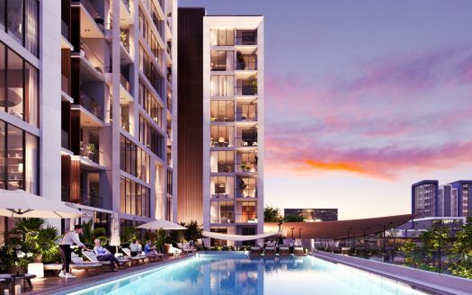 Un edificio di appartamenti di lusso a Dubai con una piscina all'aperto dove ci si rilassa sui lettini a bordo piscina al tramonto, caratterizzato da un'architettura moderna con balconi e grandi finestre.