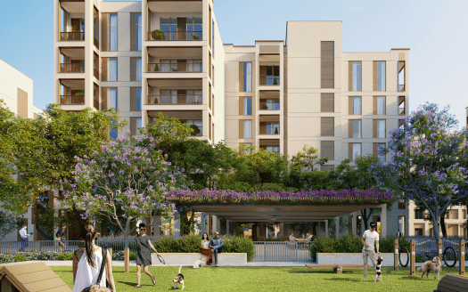 Moderne palazzine con balconi circondate da un verde lussureggiante e da alberi dai fiori viola. Persone che passeggiano e si rilassano in un vivace parco comune con panchine e un sentiero.
