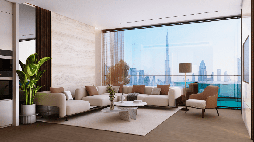 Un moderno salotto del The One con un'ampia finestra panoramica che offre una vista sui tetti della città. La stanza comprende due divani color crema, un tavolino rotondo, una pianta e una poltrona singola. L'arredamento è minimalista, con toni neutri e pavimenti in parquet, e riflette l'elegante filosofia di design di Binghatti.