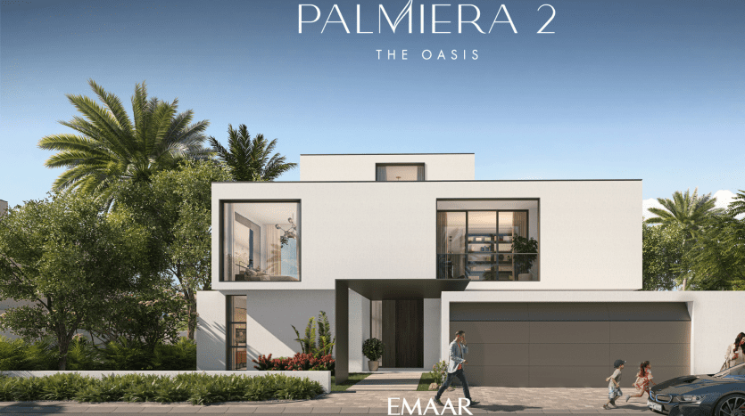 Une villa moderne de deux étages intitulée "PALMIERA 2 - THE OASIS" par Emaar. L'extérieur présente des lignes épurées, de grandes fenêtres et est entouré d'une verdure luxuriante, avec des passants à proximité.