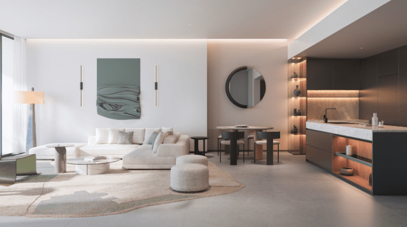 A modern, minimalist living space at W Residences Dubai Harbour features an open floor plan. It features a white sectional sofa, abstract wall art and a round dining table with chairs. The kitchen features elegant cabinetry, ornate open shelving and a marble countertop. Soft lighting enhances the ambience.