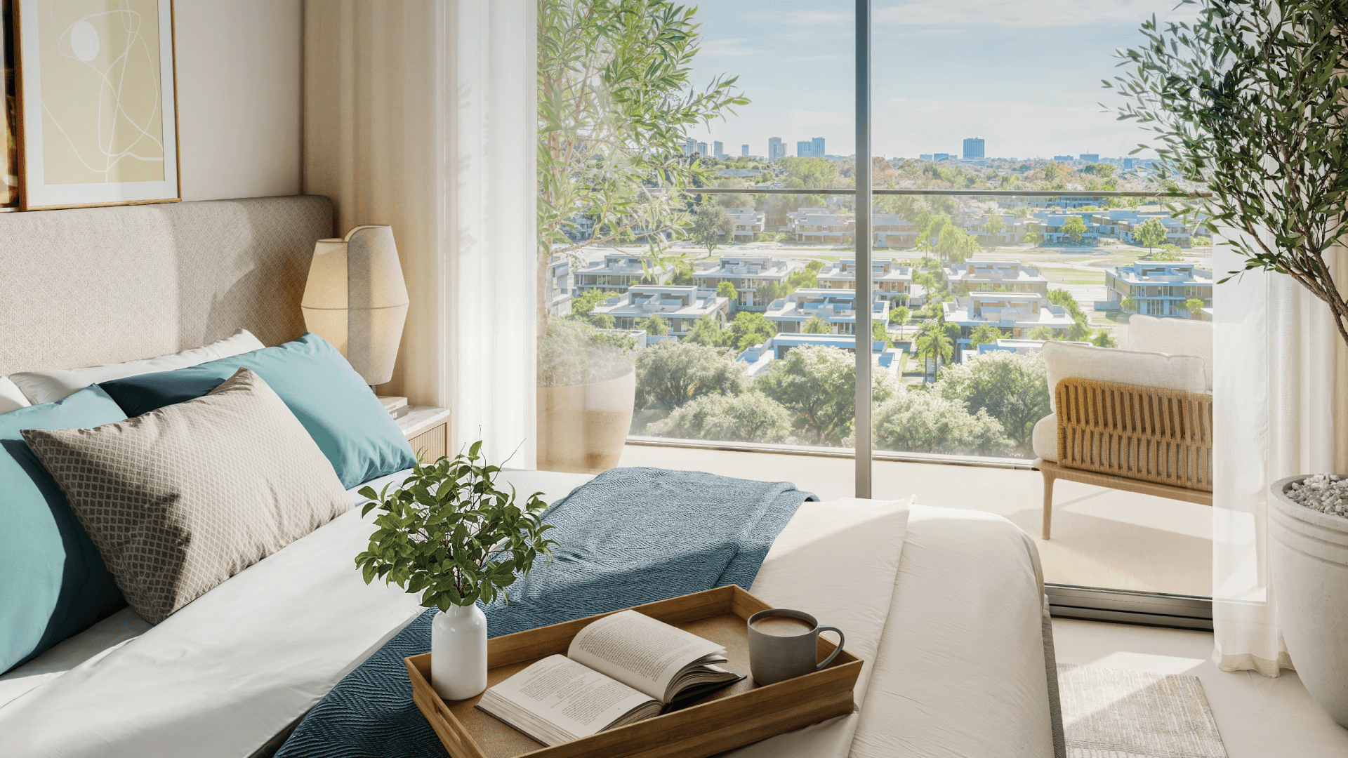 A sunny room at the Vida residence features a carefully made bed with teal and beige pillows. A tray with an open book and coffee mug rests invitingly on the bed. Large glass doors reveal a serene, verdant landscape and distant cityscape, while a potted plant adds charm to the corner.