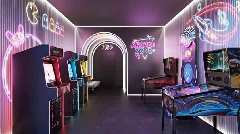 Une salle d'arcade rétro très éclairée sur Parkway présente des néons et des machines d'arcade, dont des classiques comme Pac-Man. Il y a un flipper au premier plan, des enseignes au néon colorées sur les murs et une arche lumineuse menant à une autre salle.