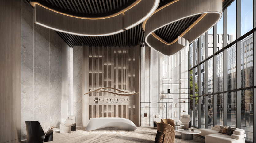 Le hall d'entrée moderne est doté de hauts plafonds et d'un comptoir de réception siglé « Prestige One ». Des meubles élégants, notamment des chaises et des tables marron et noires, ornent l'espace. De grandes fenêtres révèlent une vue sur les bâtiments de la ville, renforçant l'atmosphère lumineuse et luxueuse.