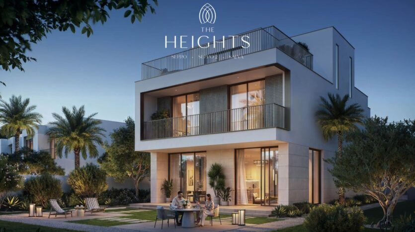 Une maison moderne de deux étages avec de grandes fenêtres et des balcons, entourée de palmiers et d'un jardin paysager. Trois personnes sont assises à une table ronde à l'extérieur. La mention "The Heights" est élégamment affichée en haut de l'image.