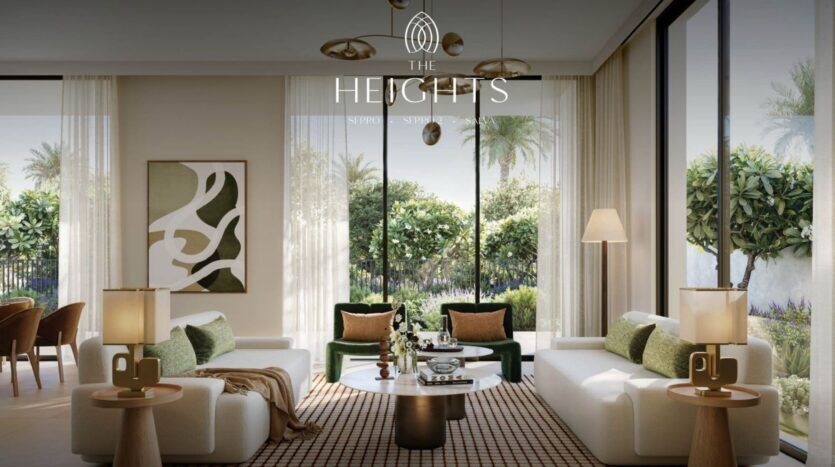 Salon moderne de The Heights avec deux canapés blancs, des accents verts, une table basse ronde, des lampes élégantes, des œuvres d'art murales abstraites et de grandes fenêtres allant du sol au plafond et donnant sur un jardin luxuriant. Le logo "The Heights" apparaît en haut au centre.