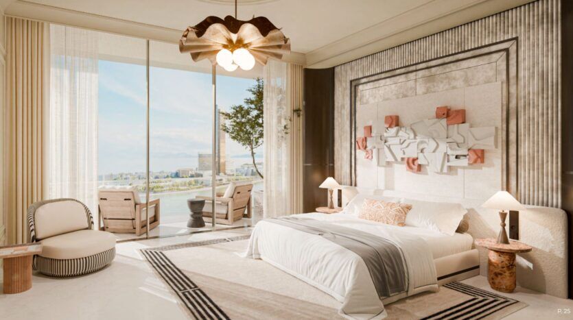 The modern and bright room at the Château features a large bed, neutral décor, abstract wall art, light wood furniture, and floor-to-ceiling windows opening onto a balcony with water views and outdoor seating.