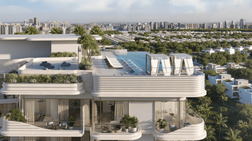 La luxueuse piscine à débordement sur le toit du Cybele by Wadan comprend des cabanas et des chaises longues au sommet d'un gratte-ciel blanc moderne, entouré de verdure et surplombant une ville tentaculaire et un quartier résidentiel au loin.