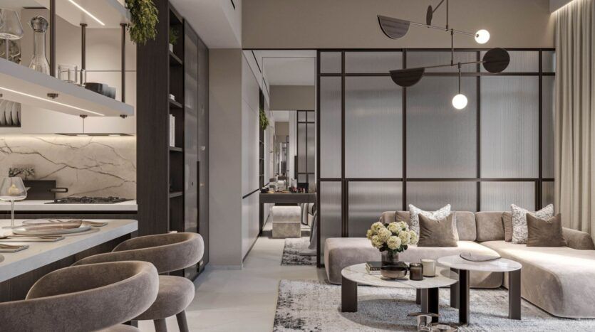 Un salon et une cuisine modernes et ouverts avec des tons neutres, des sièges en peluche, des touches de marbre, un décor minimaliste, des tables basses rondes, un luminaire suspendu et une grande fenêtre avec des rideaux diaphanes - faites l'expérience de l'élégance avec Tresora by Wadan.