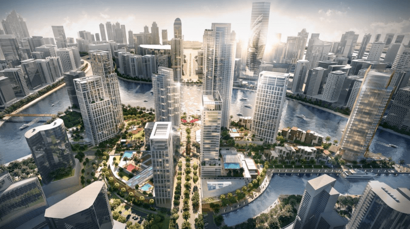 Vue aérienne de The Peninsula Dubai, avec des gratte-ciel imposants aux façades de verre réfléchissantes, des espaces verts luxuriants et des rivières sinueuses, éclairées par la douce lumière du soleil.