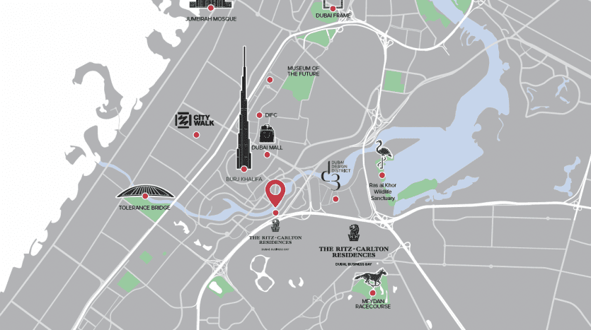Carte monochrome montrant les principaux monuments et rues de Dubaï. Les symboles d'attractions telles que les centres commerciaux, les mosquées et les parcs sont visibles. Une épingle rouge marque un emplacement spécifique d’intérêt d’investissement. La rivière et les espaces verts
