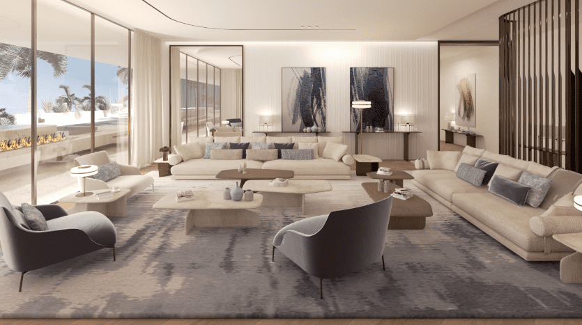 Un salon luxueux dans une villa à Dubaï aux tons neutres avec plusieurs coins salons, des baies vitrées et une décoration élégante, avec une vue sur l'océan et une cheminée confortable.