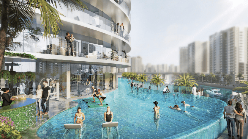 Une piscine extérieure animée par une journée ensoleillée dans un luxueux complexe d'appartements à Dubaï, où les gens nagent et se détendent, entourés d'une verdure luxuriante et d'une architecture moderne.