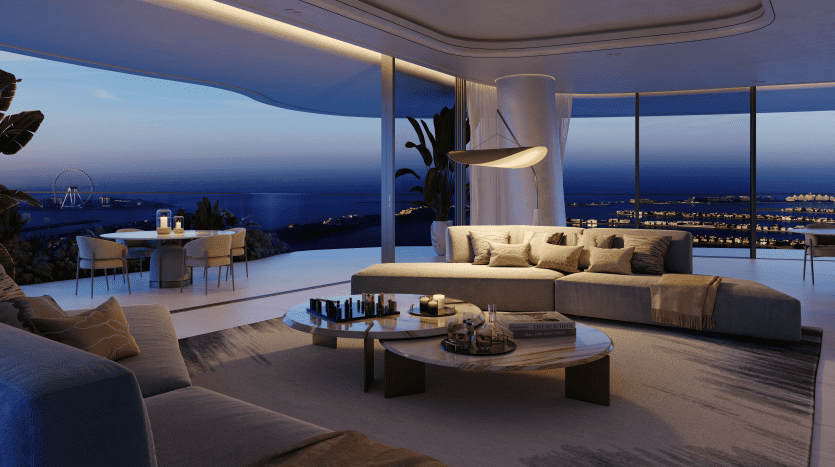 Salon luxueux dans une villa de Dubaï avec un canapé incurvé moderne et des tables basses rondes, donnant sur la vue nocturne côtière de la ville à travers des baies vitrées. Un éclairage doux et une décoration minimaliste rehaussent le