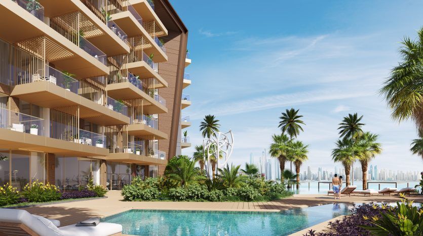 Une station balnéaire luxueuse composée d'immeubles à plusieurs étages avec de grands balcons, donnant sur une piscine tranquille bordée de palmiers et de chaises longues sous un ciel bleu clair, répertoriée en exclusivité par une agenceimmobilière d'élite.