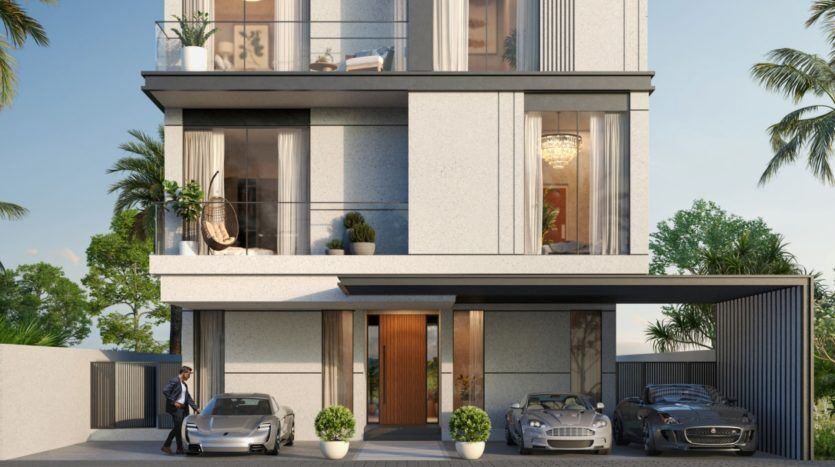 Une villa moderne de deux étages à Dubaï avec un toit plat, de grandes fenêtres, un balcon et une entrée élégante. Deux voitures de luxe sont garées devant et un homme en costume se tient à côté de l'une d'entre elles.