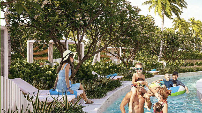 Une scène de piscine tropicale avec des gens pratiquant des activités nautiques, des palmiers luxuriants et des buissons en fleurs entourent la zone, renforçant l'atmosphère sereine et de vacances de cette exquise villa à Dubaï.